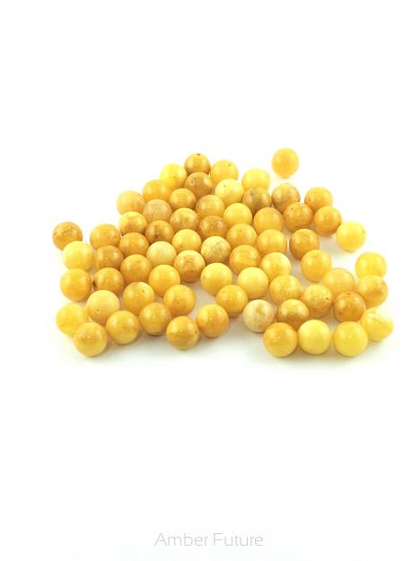 Prasowana kulka z bursztynu 10mm, wiercona, żółta